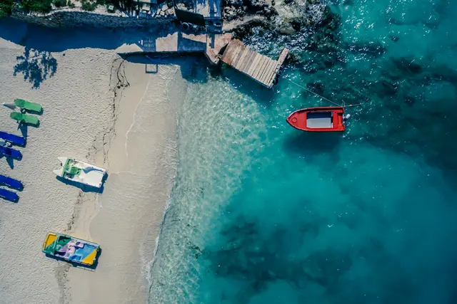 A small boat on calm turquoise water