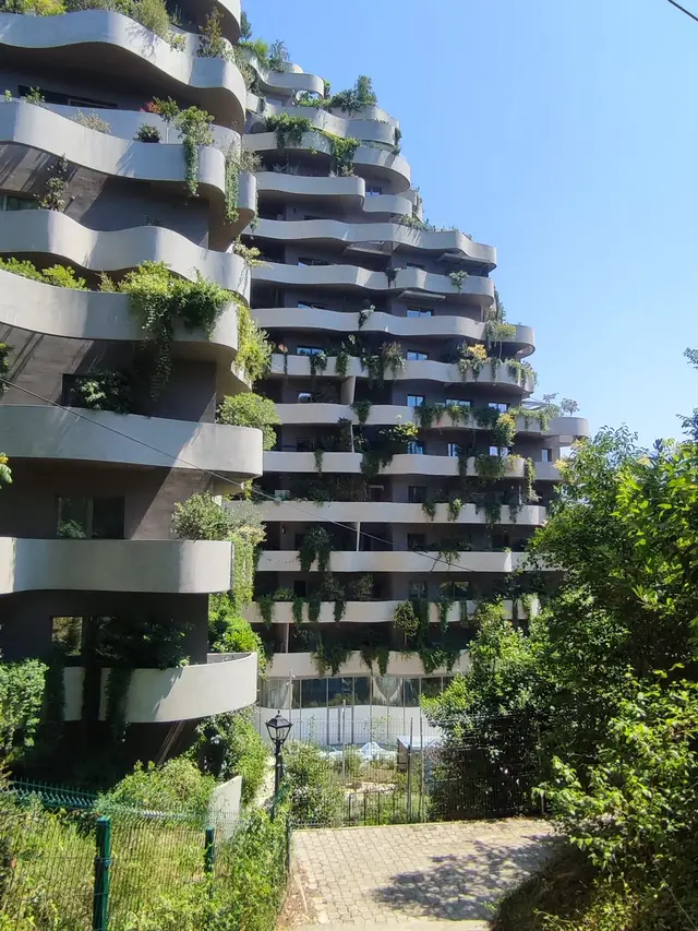 A plant-covered apartment tower in Tirana