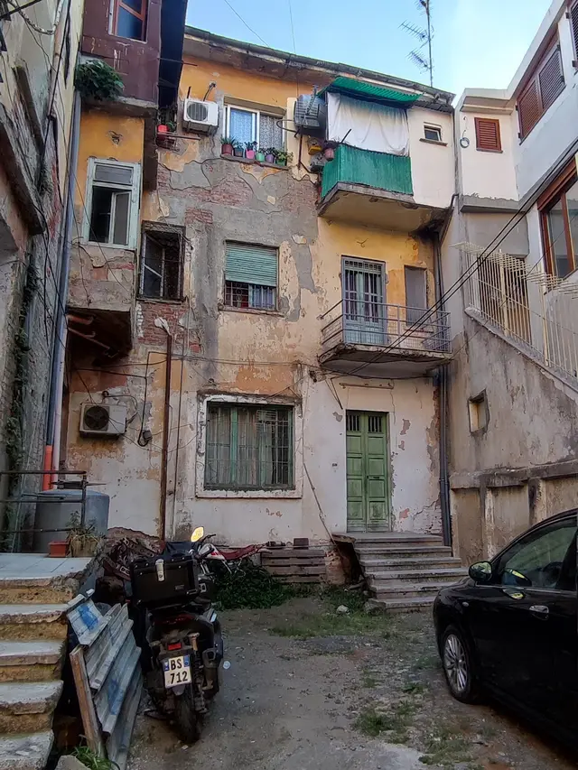 A weathered inner courtyard in central Tirana